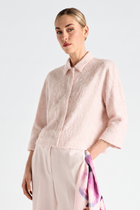 Veste-chemisier crème effilochée et brillante manche trois-quarts
