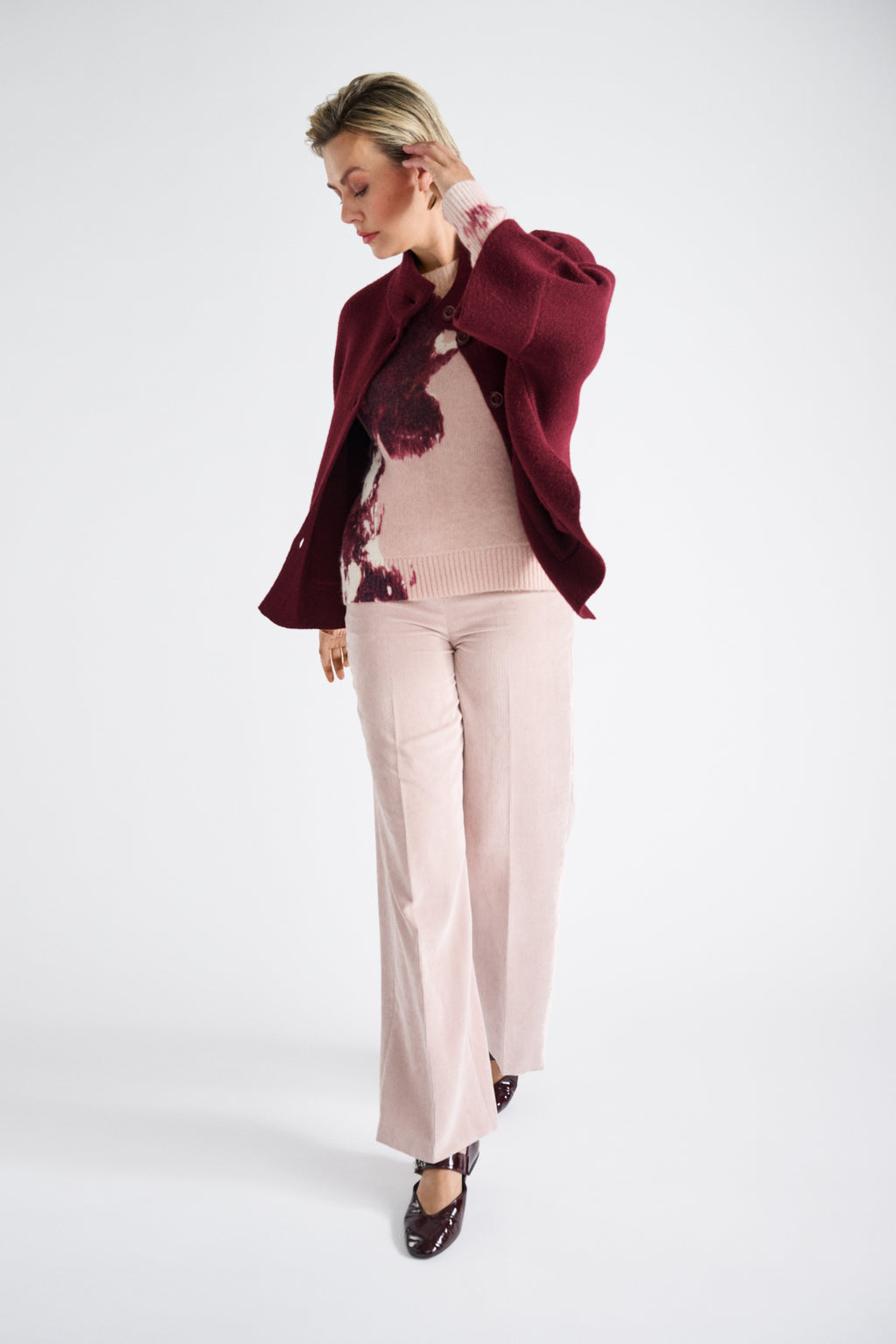 Buttoned burgundy cape-sweater with turtleneck
