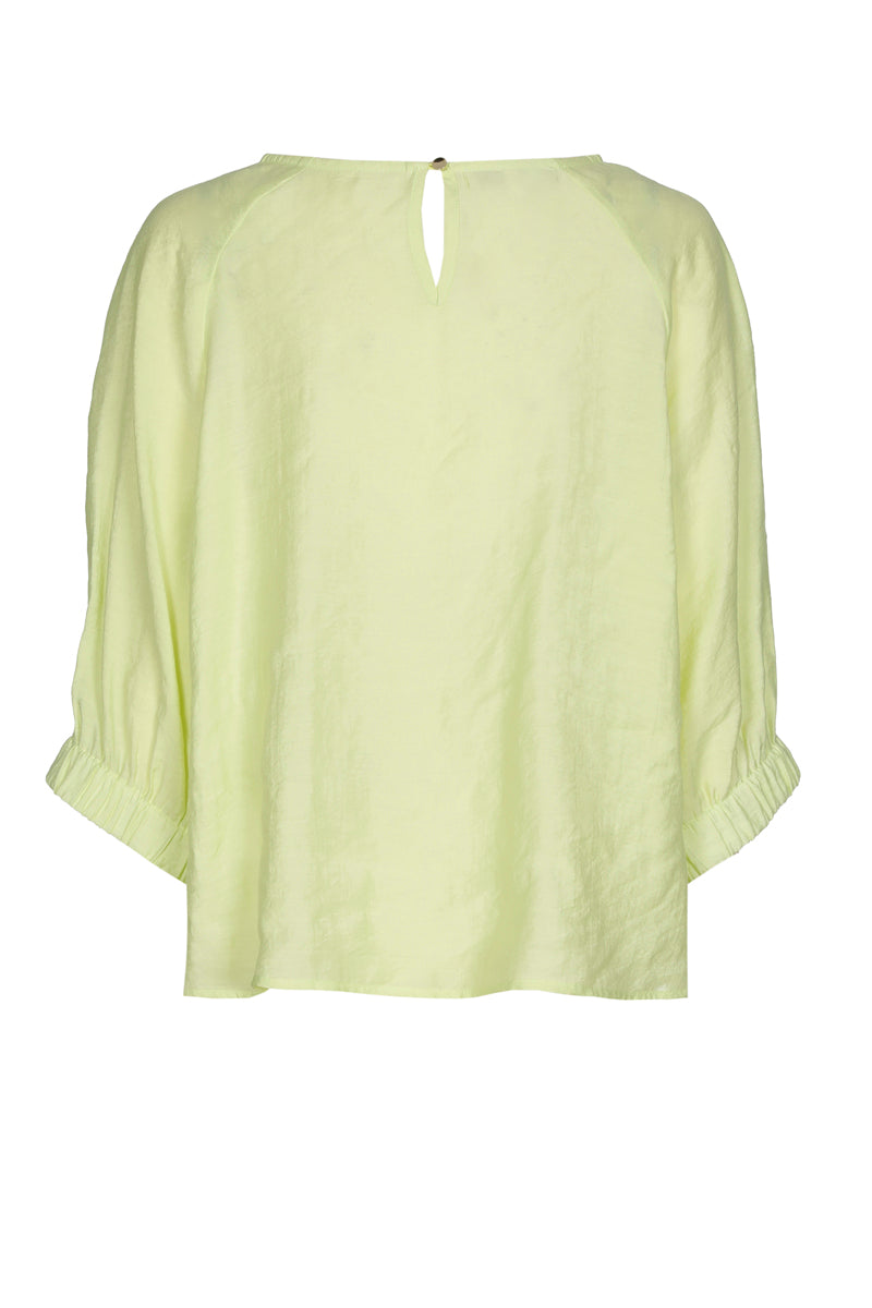 Lime-colored blouse with three-quarter sleeves and elasticated finish