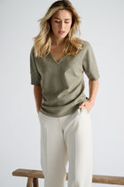 Groene pull met V-hals en korte mouwen