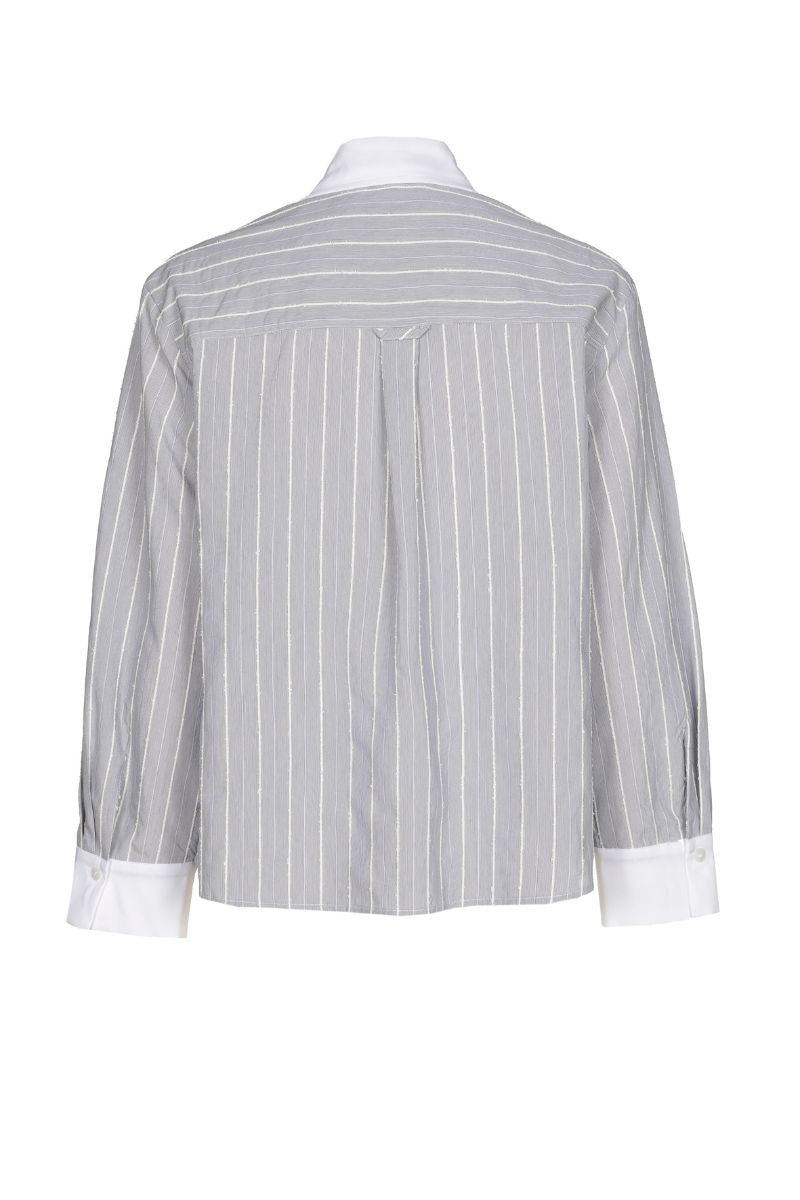 Blouse élégante à rayures bleues et écrues