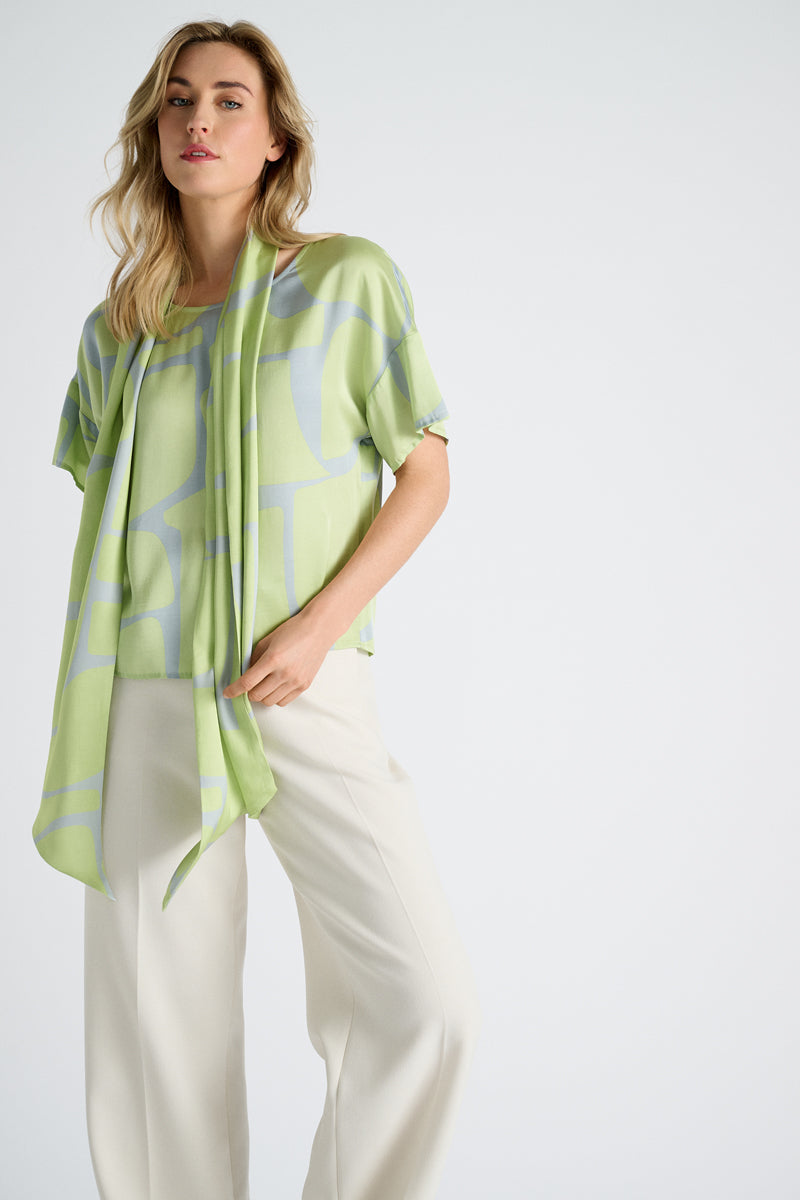 EN EXCLUSIVITÉ DANS NOS CONCEPT STORES : Chemisier à imprimé gris et citron vert