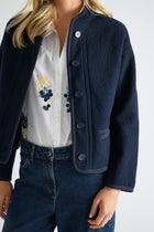 Donkerblauw jasje in vervilte wol