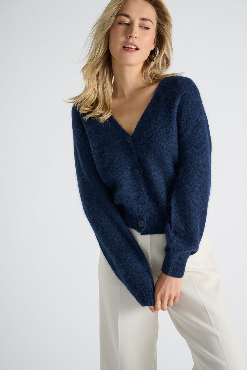 Cardigan bleu avec fermeture à bouton
