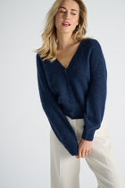Cardigan bleu avec fermeture à bouton