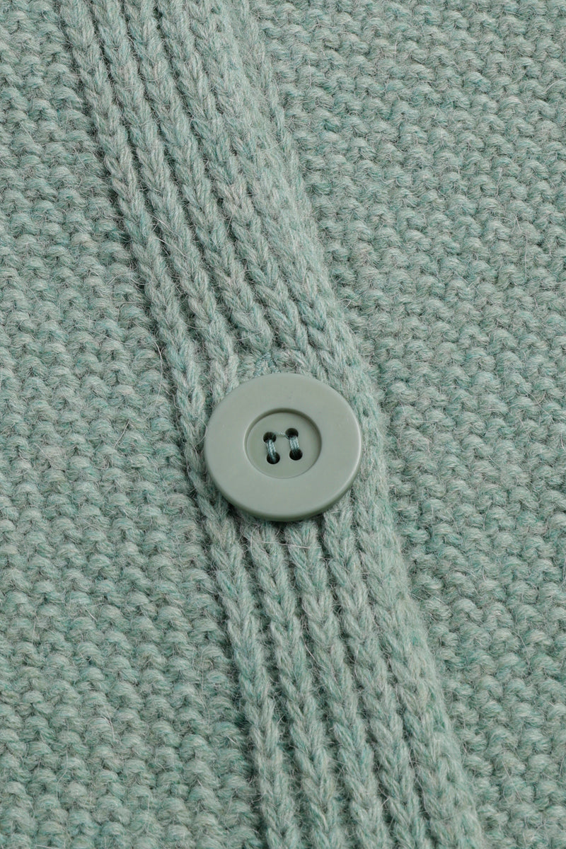 Groene cape met knoopsluiting