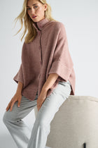 Oudroze cape met knoopsluiting