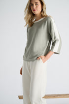 Pull boothals in olijfkleur met ecru boorden