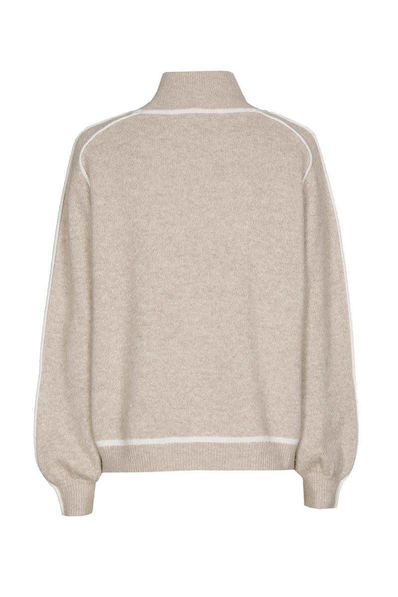 Pull beige à col montant