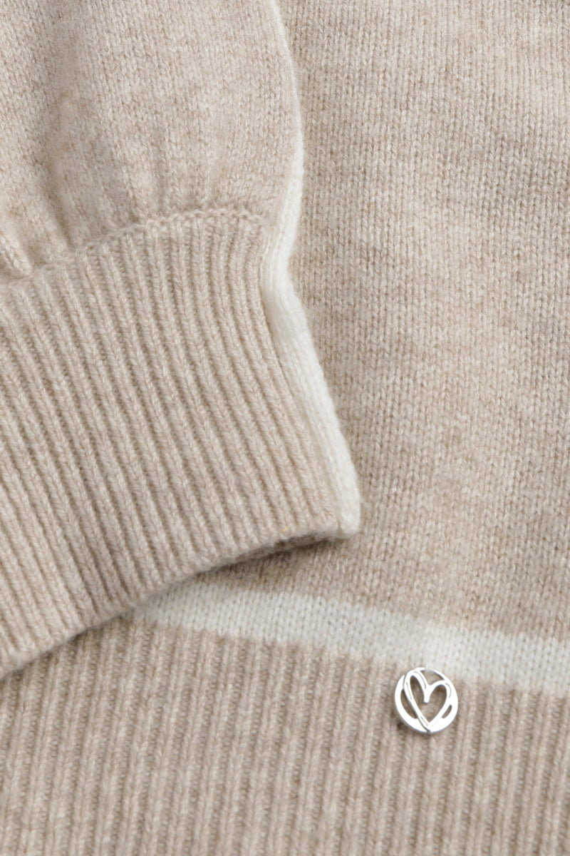 Pull beige à col montant