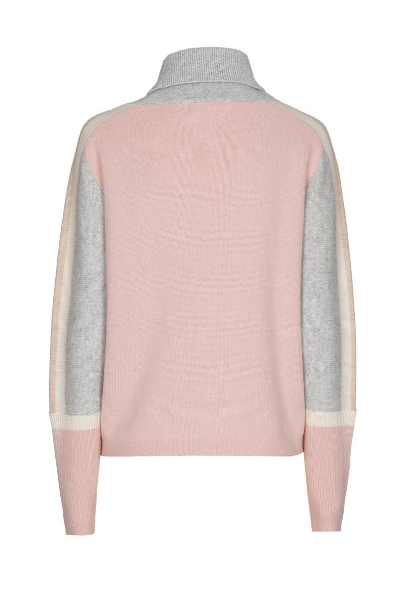 Pull rose à col roulé