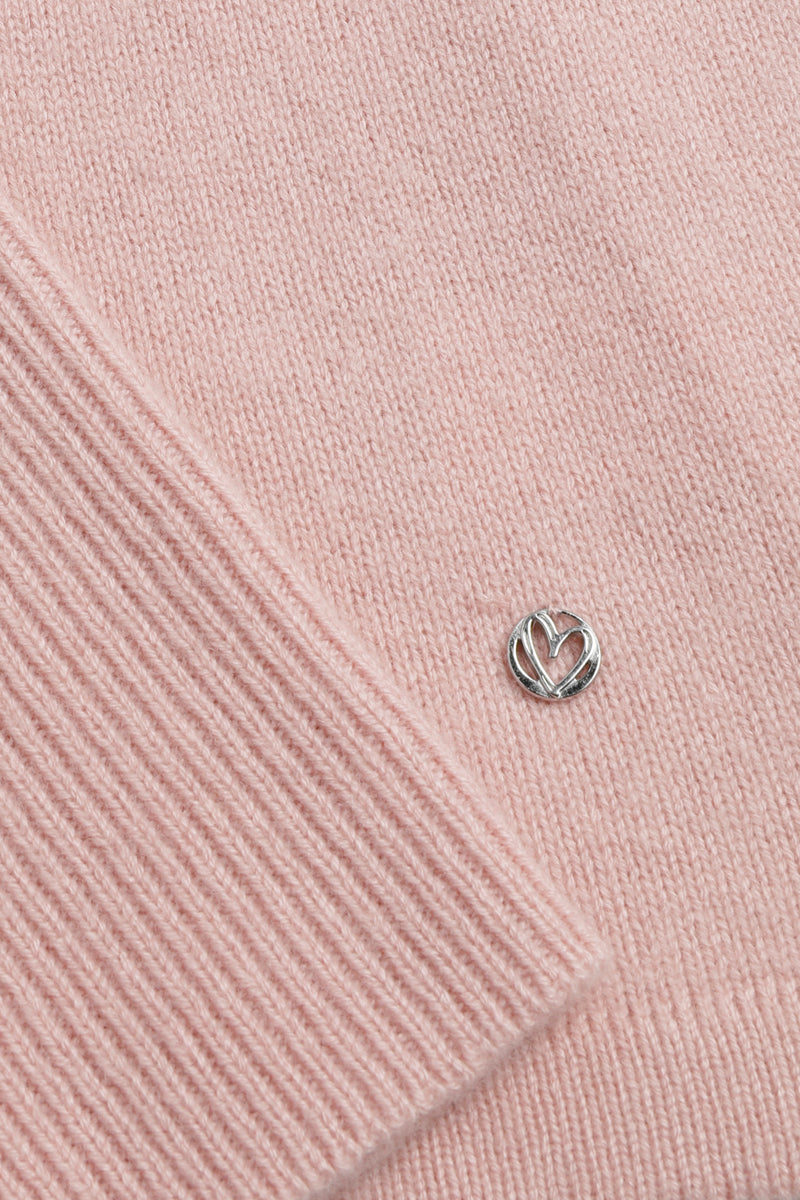 Pull rose à col roulé