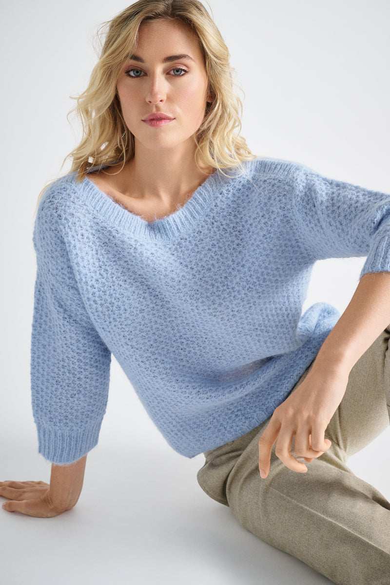 Lichtblauwe pull met ronde hals en korte mouwen
