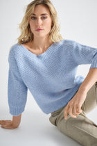 Lichtblauwe pull met ronde hals en korte mouwen