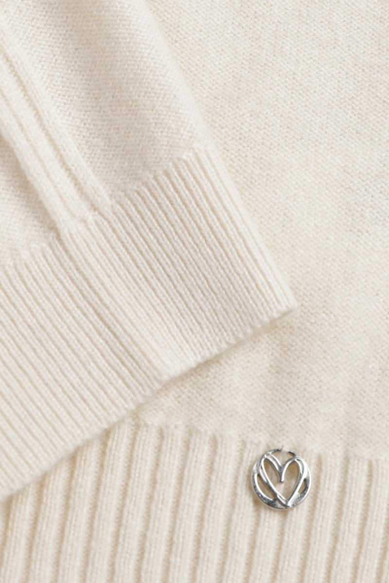 Pull ecru met boothals