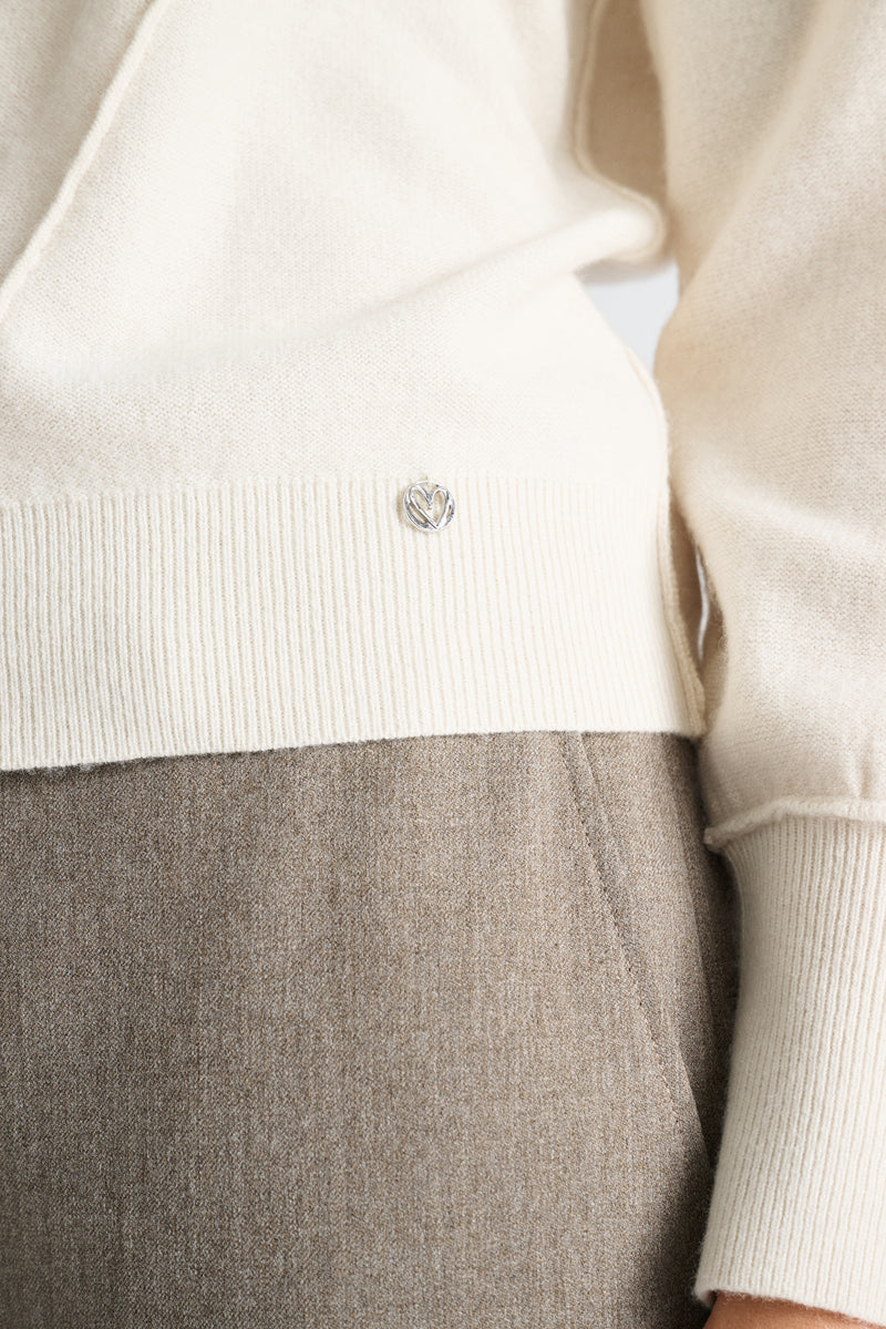 Ecru pull met v-hals