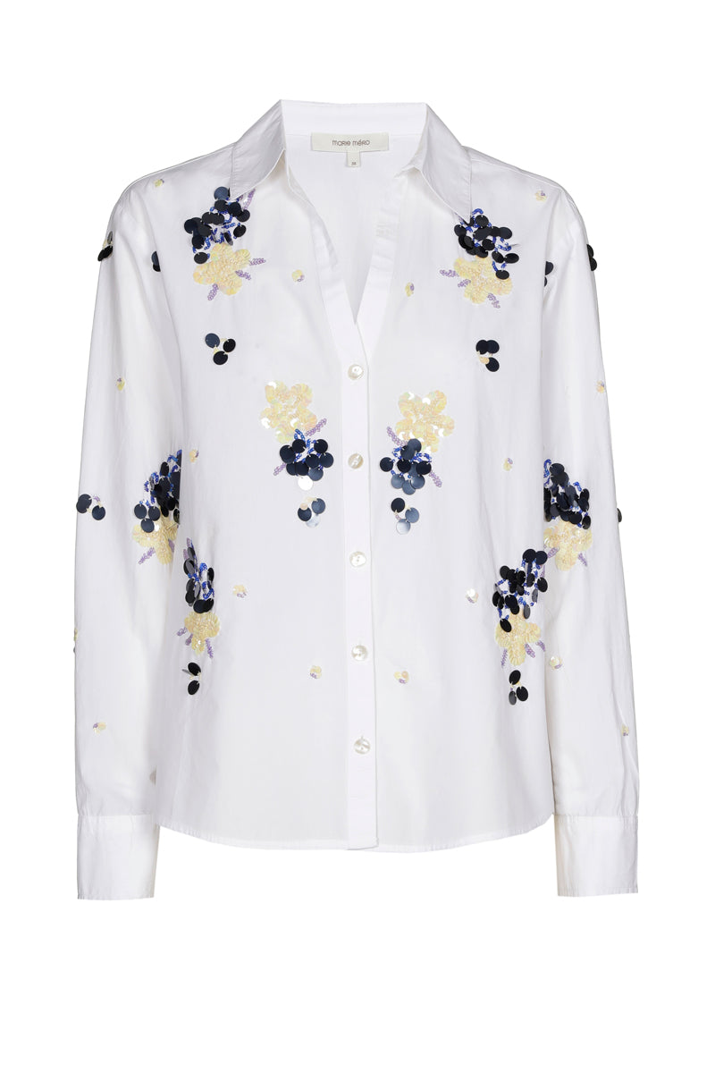 Witte bloes met blauwe pailletten