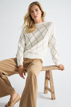 Pull in ecru with gold check pattern