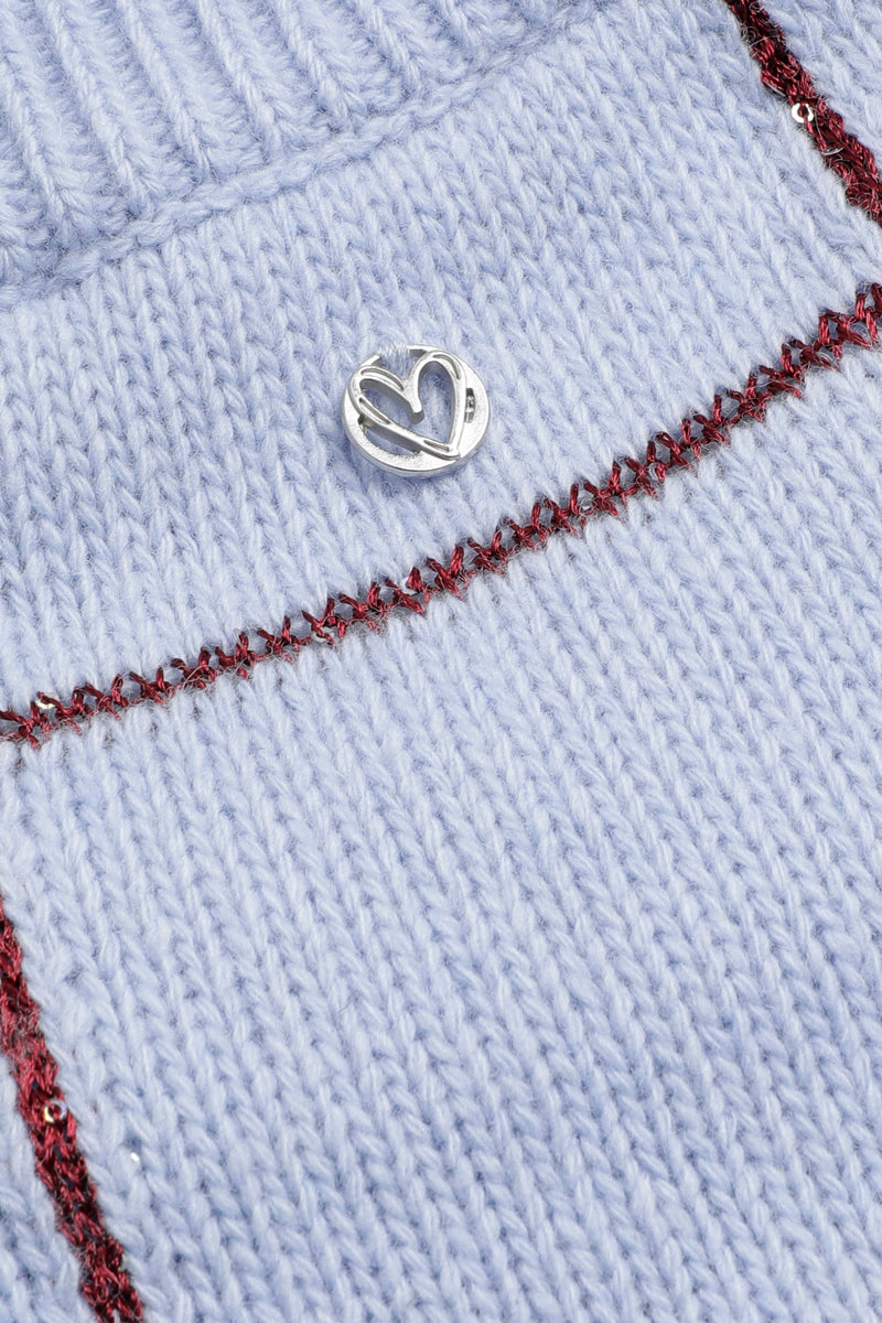 Light blue sweater with burgundy checks