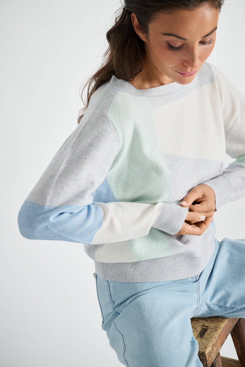 Pull gris à col rond avec blocs de couleurs