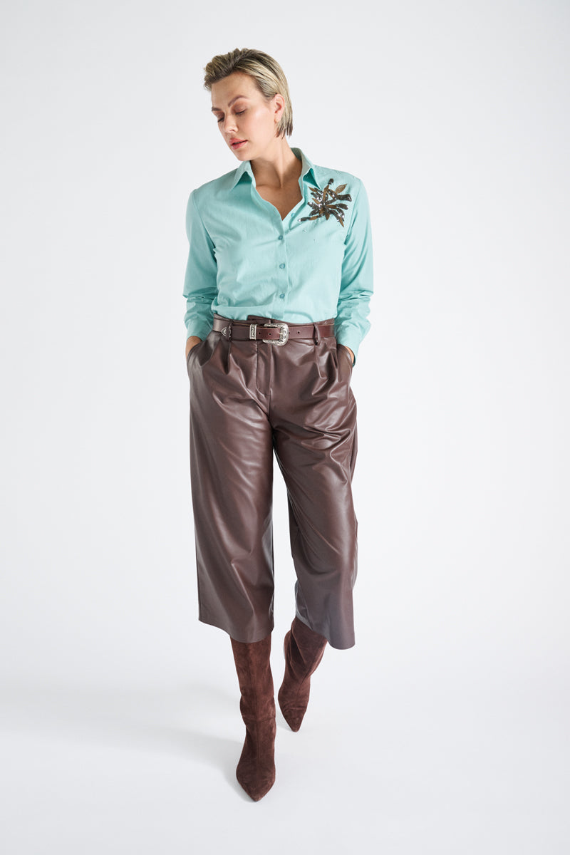 Turquoise cotton shirt with sequins flower