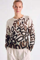 Graphic faded sweater with cut neck