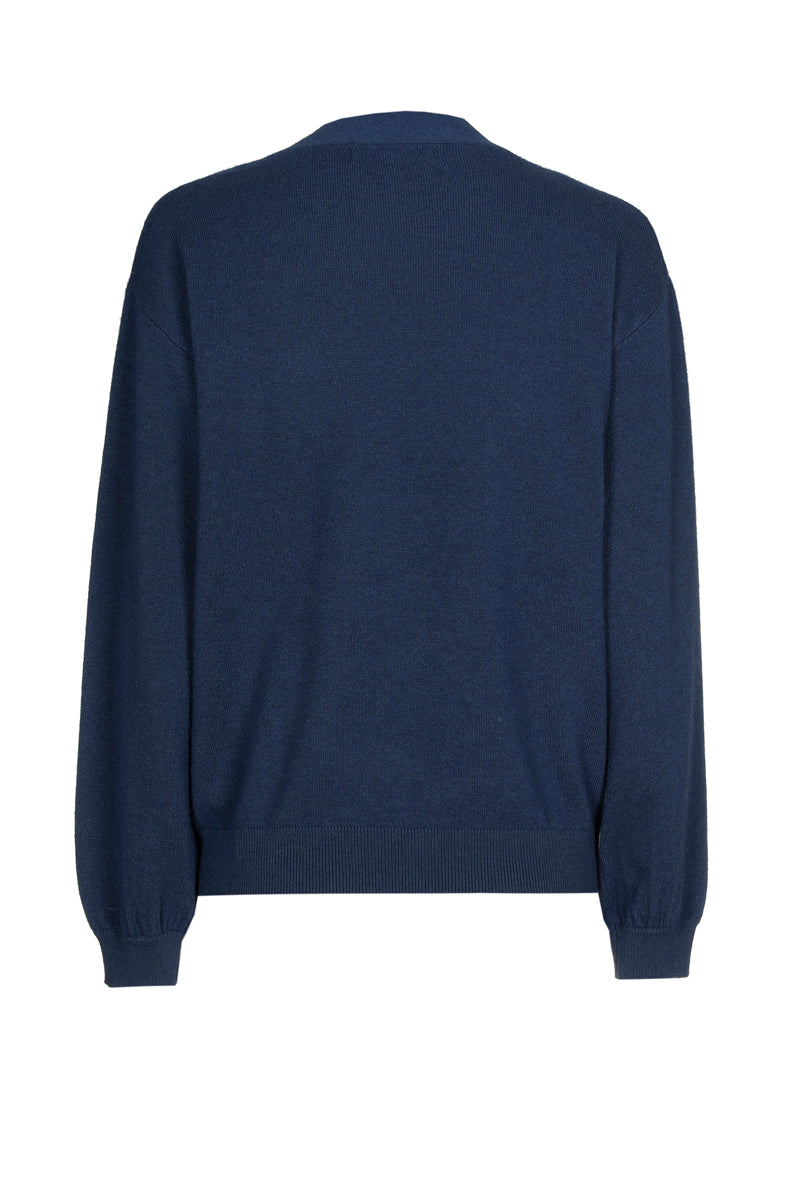 Fijn blauw wol-kasjmier truitje met strikkraag