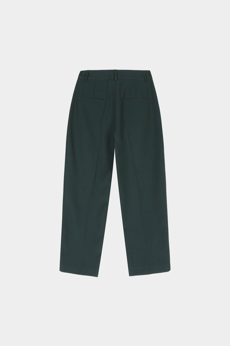 Ankle-length deep green trousers with pleats