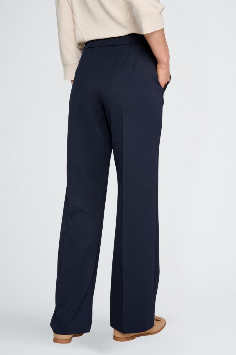 Wijde donkerblauwe broek met rits opzij