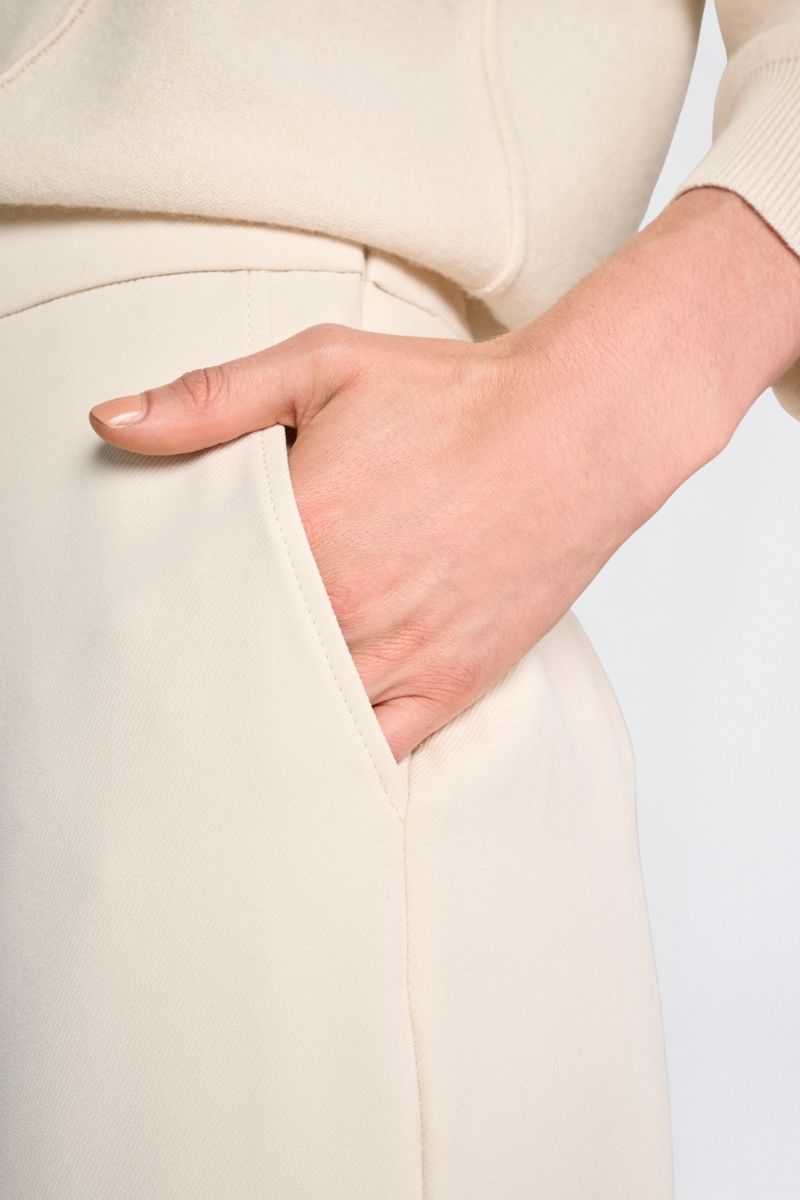 Wijde ecru broek met rits opzij