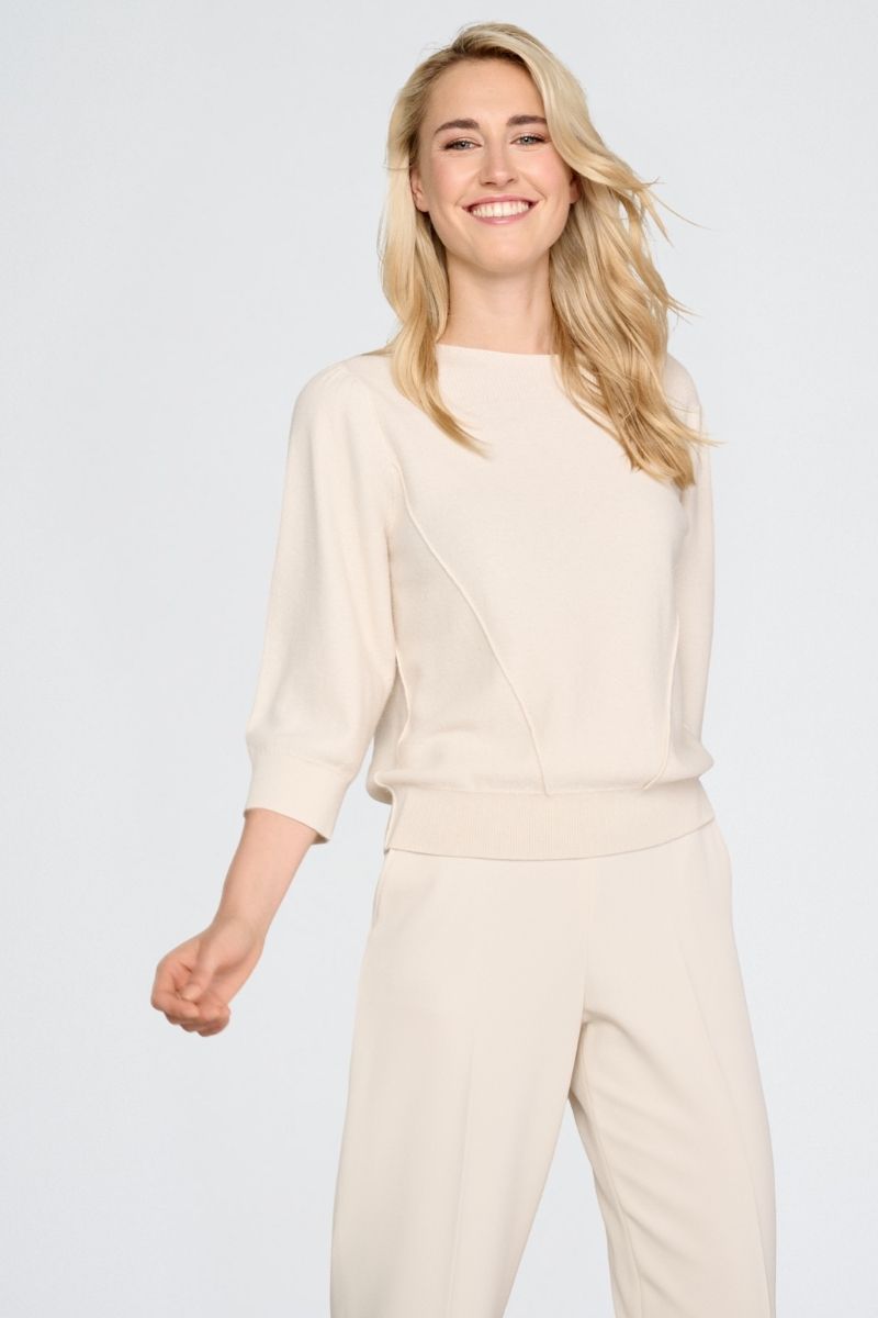 Wijde ecru broek met rits opzij