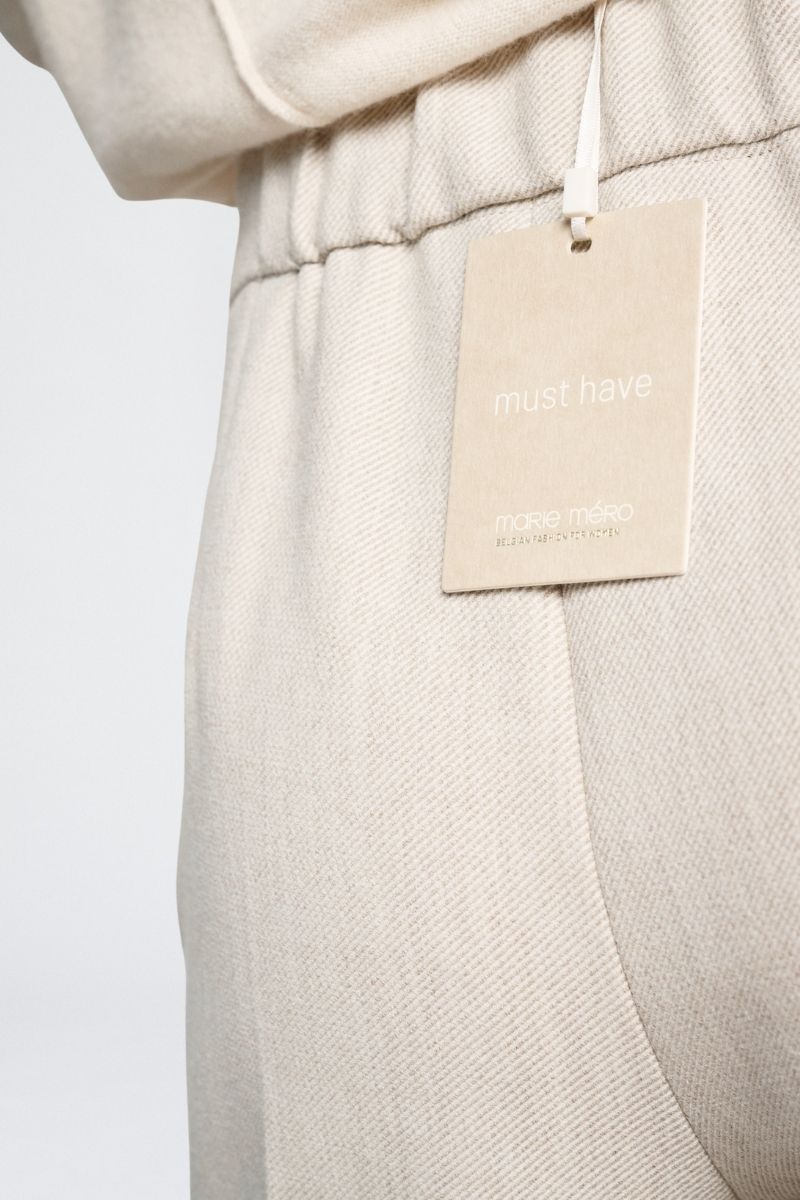 Wijde beige broek in zachte wolkwaliteit met rits opzij