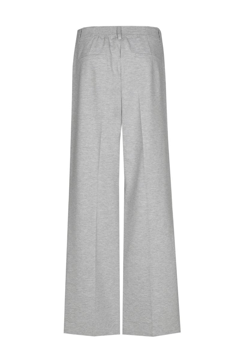 Wijde grijze broek in zachte jerseykwaliteit met rits vooraan en knoopsluiting
